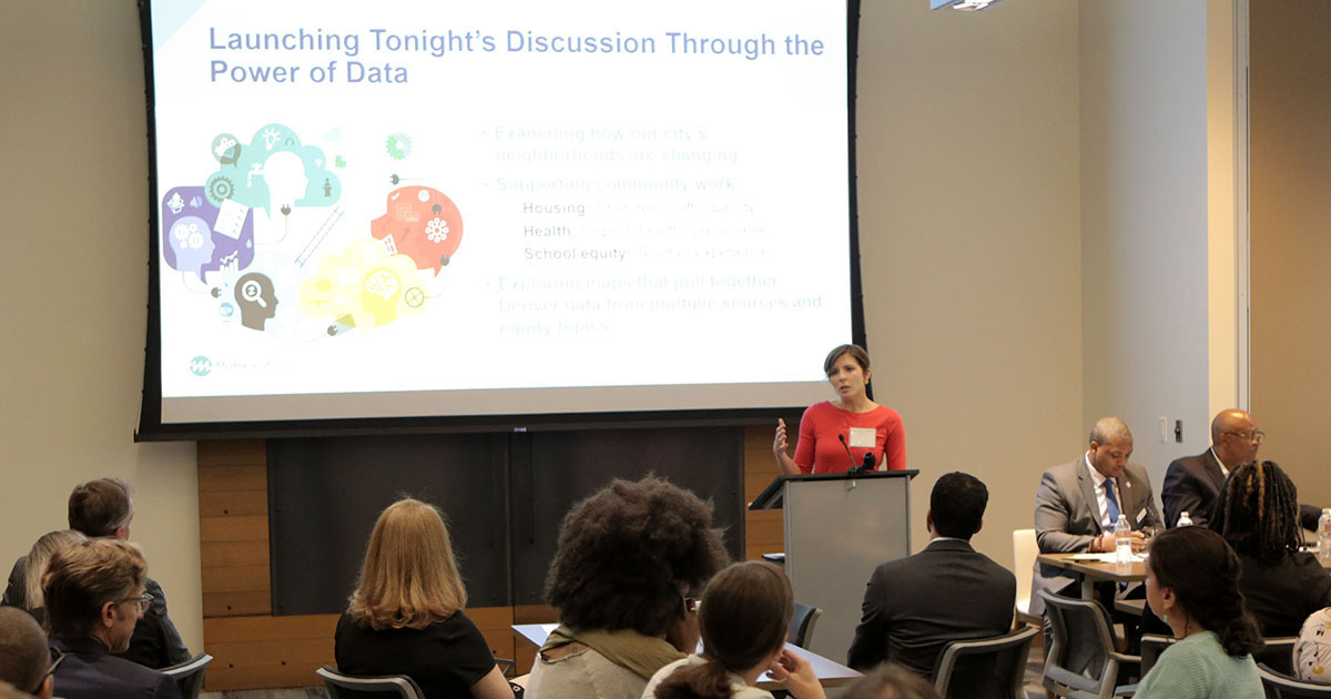 Marykate Zukiewicz, Mathematica researcher and Denver resident, presenting a data visualization on housing, education, and health trends in the Denver metro region. Photo by Rich Clement.